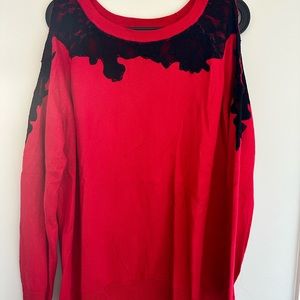 Red “cold shoulder” Torrid sweater